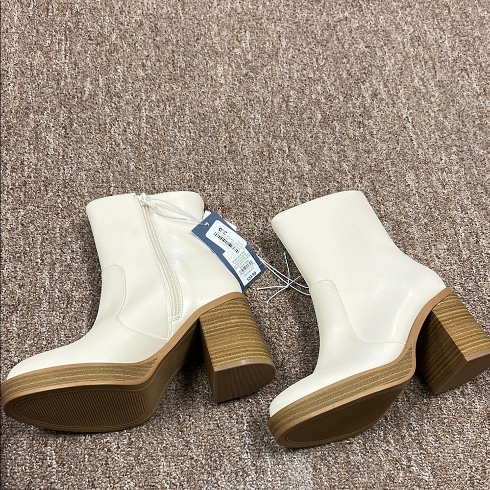 Stylish White and Tan Heeled Boots with Textured Finish